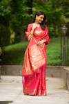 Pink color Soft banarasi silk saree with zari woven work