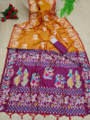 Orange color soft raw silk saree with woven design
