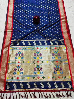 Navy blue color soft paithani silk saree with zari woven work