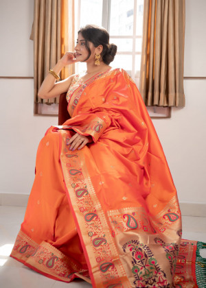 Orange  color soft banarasi silk saree with zari work
