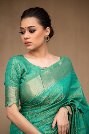 Rama green color Soft banarasi silk saree with zari woven work