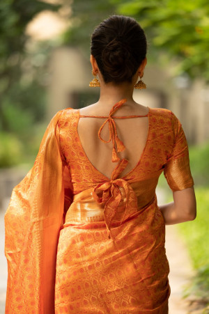 Yellow color Soft banarasi silk saree with zari woven work