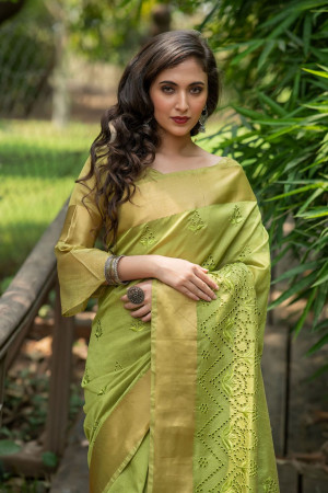 Parrot green color aasam silk saree with embroidered cut work