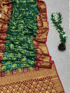 Rama green and red color bandhej silk saree with zari weaving work