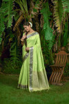 Pista green color soft Tusser silk saree with zari weaving border