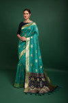 Rama green color tussar silk saree with woven design