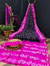 Black and rani pink color bandhani silk saree with hand bandhej work
