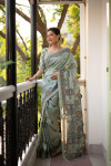 Light green color tussar silk saree with printed work