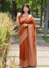 Mustard yellow  color raw silk saree with woven design