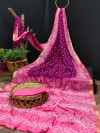 Magenta and baby pink color bandhani silk saree with hand bandhej work