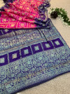 Pink and purple hand bandhej silk saree with zari weaving work