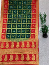 Dark green and red color hand bandhej silk saree with zari weaving work