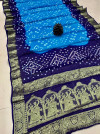 Navy blue and sky blue color bandhej silk saree with zari weaving work