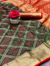 Dark green color patola silk saree with golden zari weaving work