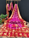 Red and pink color hand bandhej silk saree with zari weaving work
