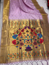 Lavender color paithani silk saree with golden zari weaving work