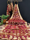 Maroon color hand bandhej silk saree with zari weaving work
