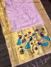 Laveder color paithani silk saree with golden zari weaving work