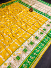 Yellow color patola silk saree with golden zari weaving work