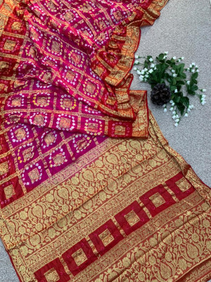 Rani pink and red hand bandhej silk saree with zari weaving work