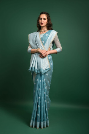Sky blue color lucknowi chikankari saree with zari weaving work