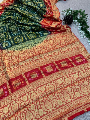Green and red hand bandhej silk saree with zari weaving work