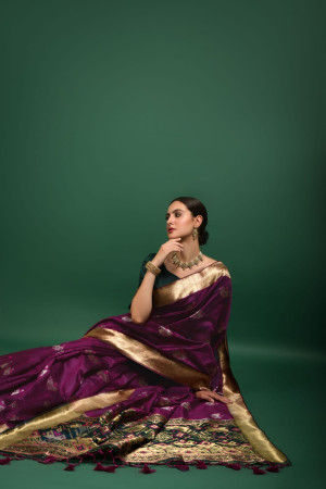 Magenta color tussar silk saree with woven design