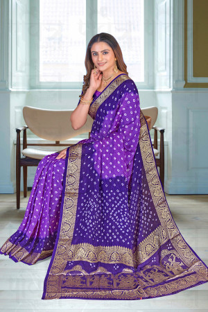 Navy blue and purple color bandhej silk saree with zari weaving work