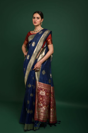 Navy blue color tussar silk saree with woven design