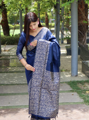 Navy blue color raw silk saree with woven design