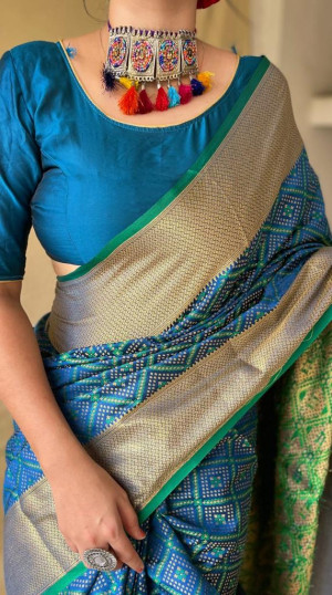Navy blue color patola silk saree with zari woven work