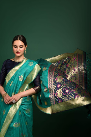 Rama green color tussar silk saree with woven design
