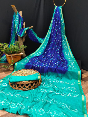 royal blue and sea green color bandhani silk saree with hand bandhej work