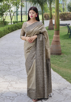 Cream color raw silk saree with woven design
