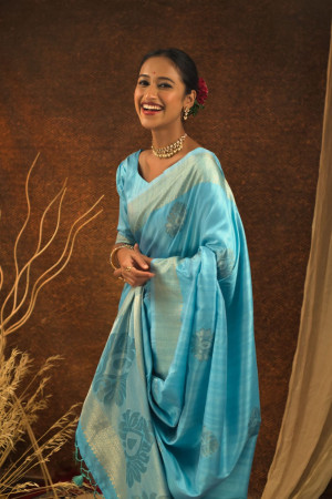 Sky blue color mulberry silk saree with zari woven work