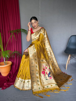Mustard yellow color paithani silk saree with zari weaving work