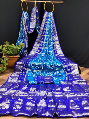Sky blue and navy blue color hand bandhej silk saree with zari weaving work