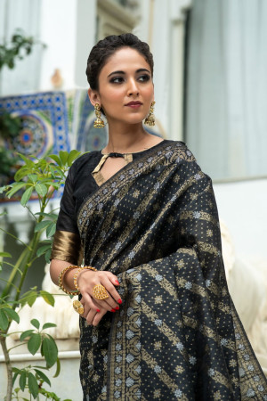 Black color tussar silk saree with zari woven work