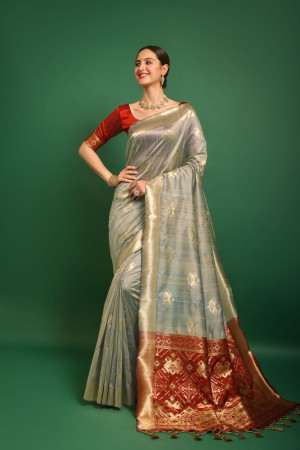 Beige color tussar silk saree with woven design