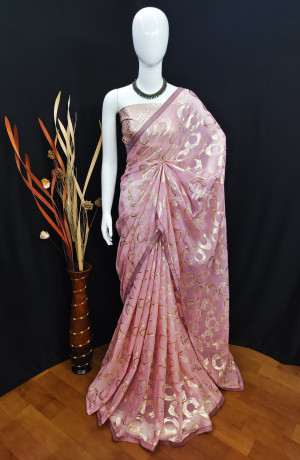 Baby pink color soft georgette saree with zari weaving work