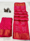 Pink color tussar silk saree with bandhani printed work