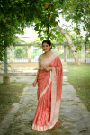 Orange tussar silk saree with checks weaving work