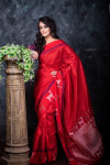Red color soft raw silk saree with zari work