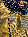 Navy blue color soft lichi silk saree with golden zari work