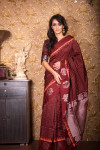 Maroon color soft raw silk saree with zari work