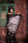 Black color soft raw silk saree with zari work