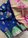 Navy blue colored Soft banarasi silk saree with woven design