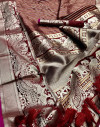 Maroon color lichi silk saree with zari work