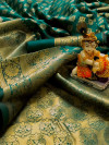 Rama green color soft banarasi silk saree with golden zari weaving work
