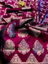 Magenta colored Banarasi silk saree with jacquard weaving work